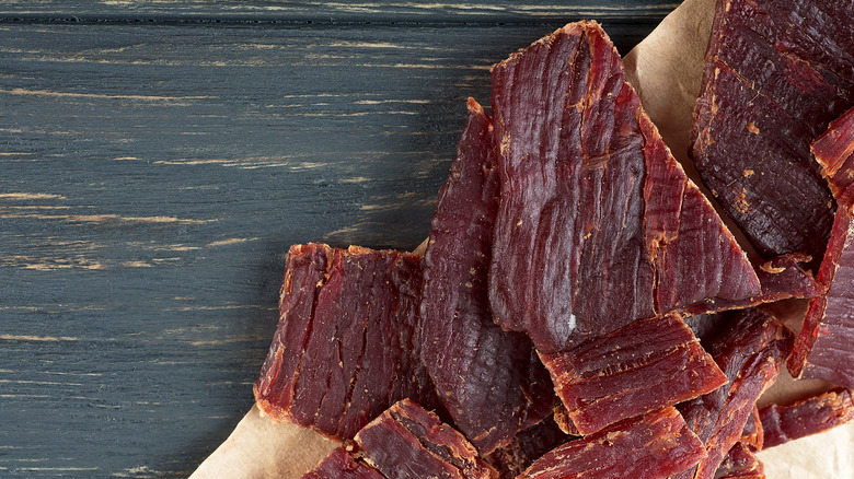 beef jerky on a wooden board