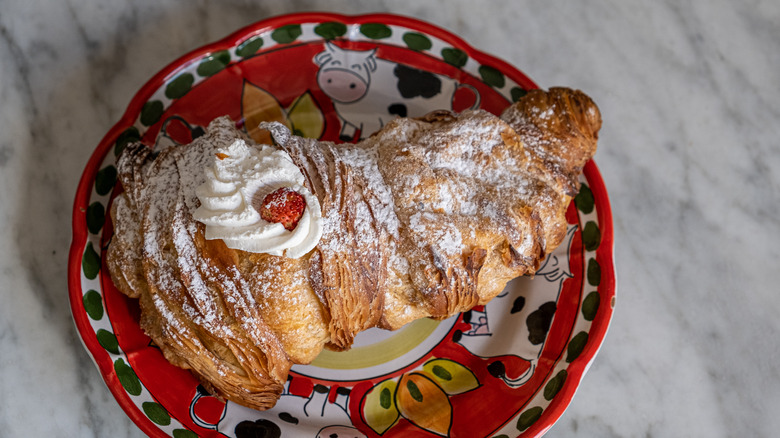 Lobster tail pastry with cherry on top