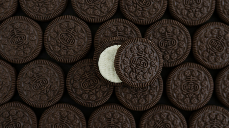 Oreo cookies against a dark background