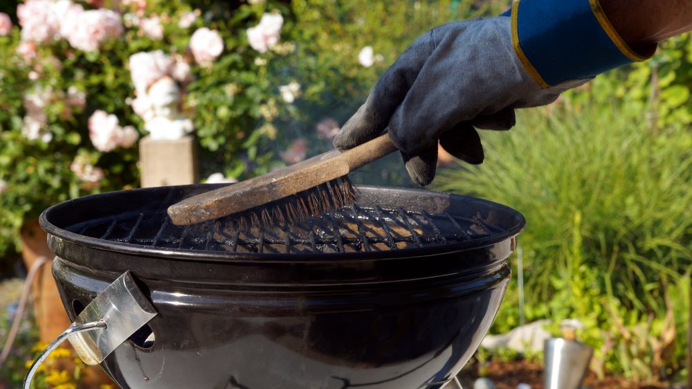 Brushing off a grill