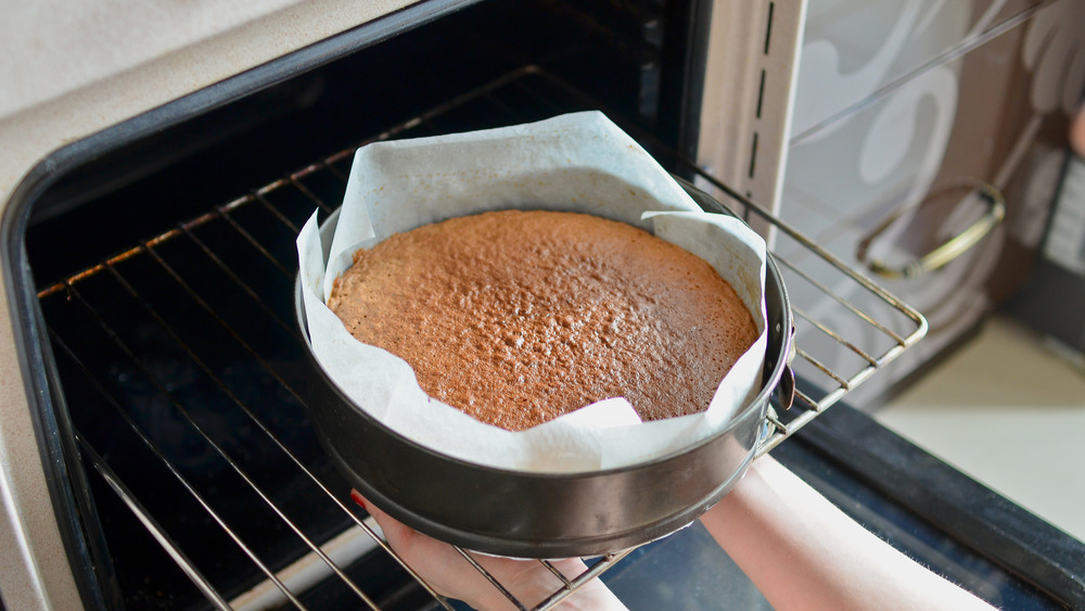 Baked cake in metal tin