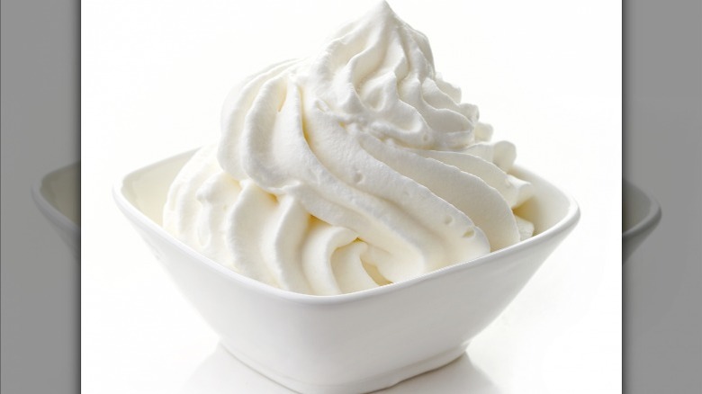 whipped cream frosting in white bowl