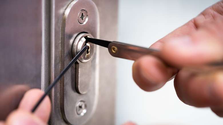 Person picking lock