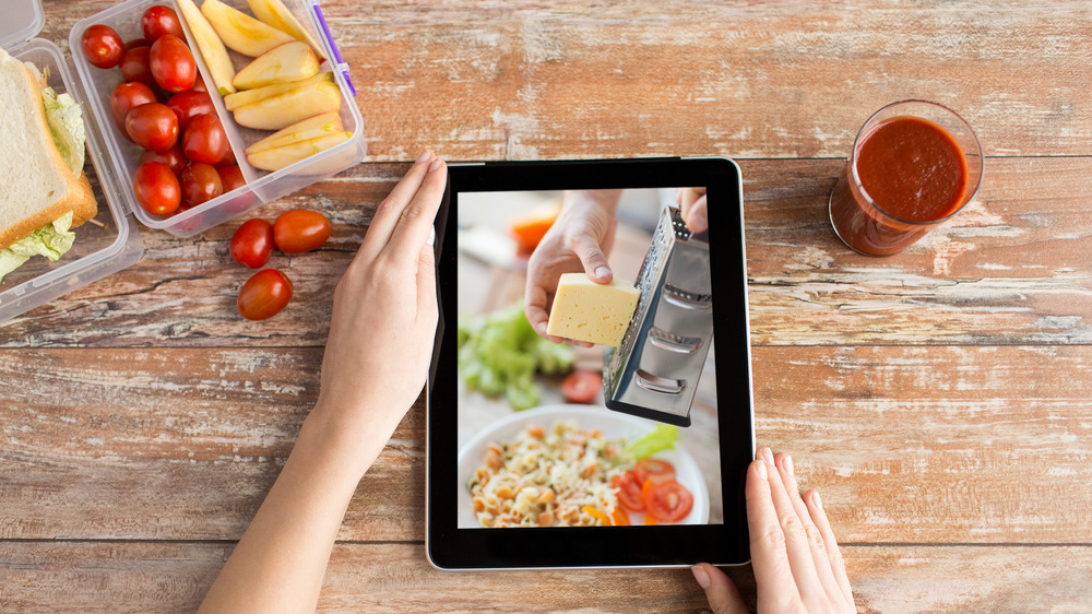 Woman looking at tablet 