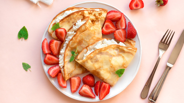 Strawberry crepes on a plate