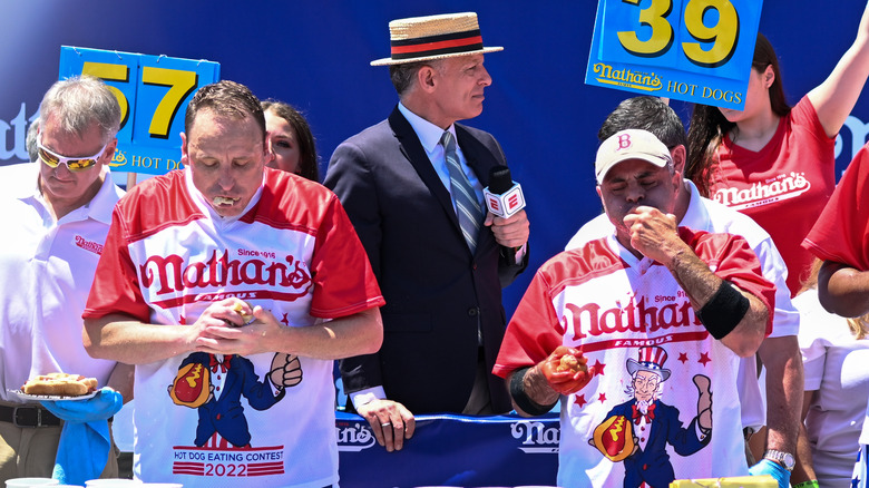 Joey Chestnut and competitor eating 
