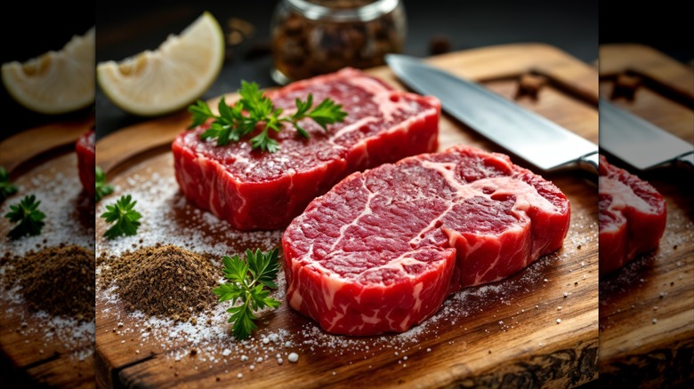 raw wagyu steaks seasoned with salt