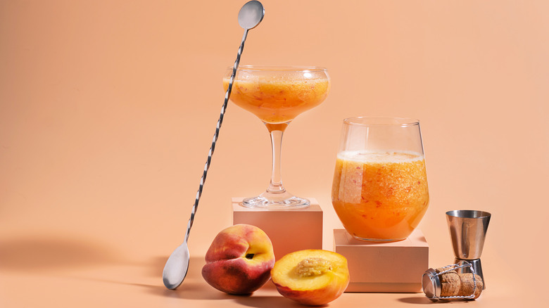 Bellini cocktail with peaches 