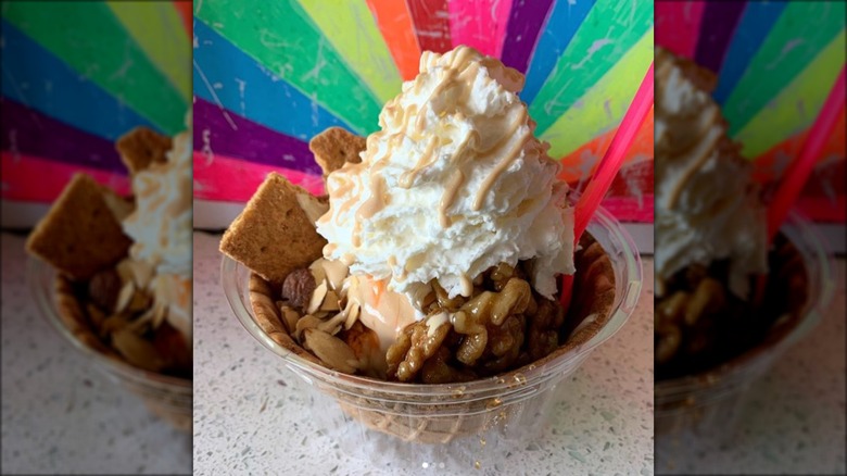 Bowl of ice cream covered with toppings