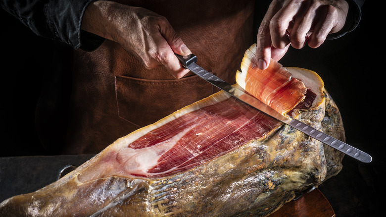 Jamón serrano being carved