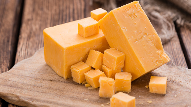 Blocks of cheddar cheese