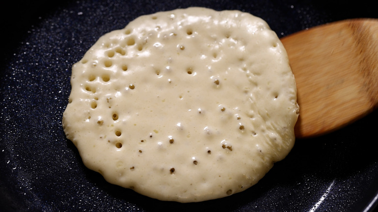 Pancake bubbling on pan