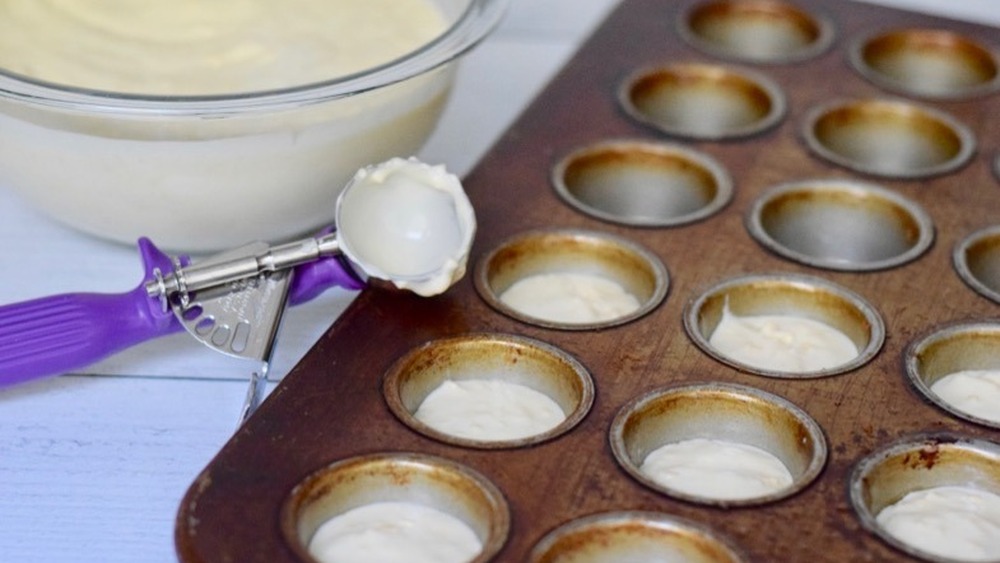 portioned pao de queijo batter in pan