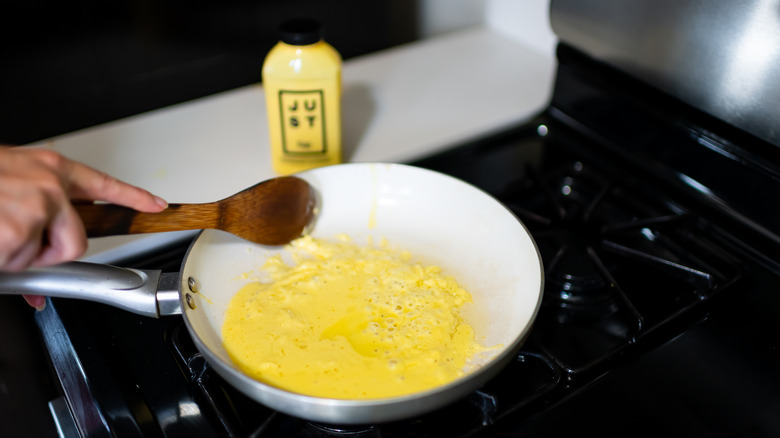 JUST egg substitute being cooked in pan
