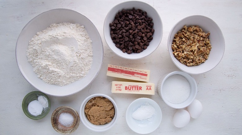 Chocolate chip cookie ingredients in bowls