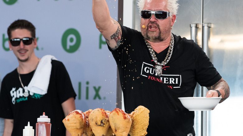 Guy Fieri seasoning drumsticks