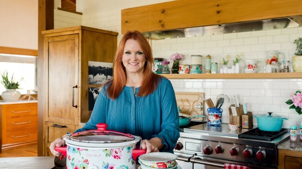 Ree Drummond smiling in kitchen with crockpot