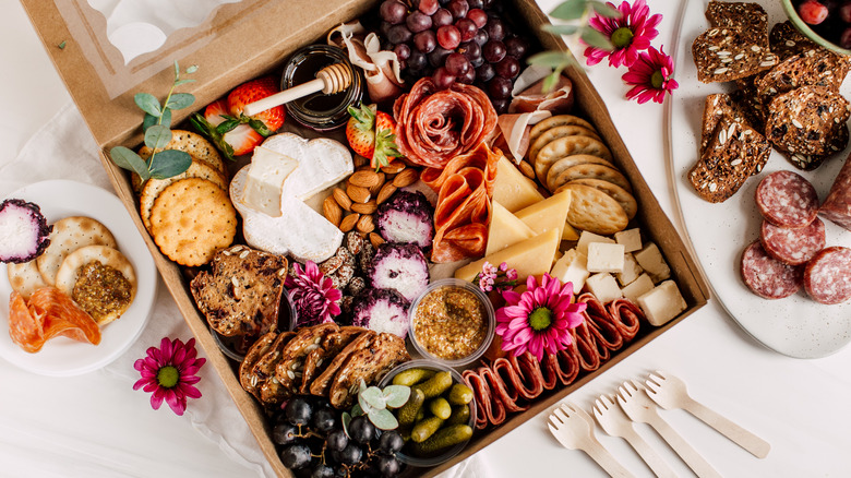 Charcuterie board on white tablecloth