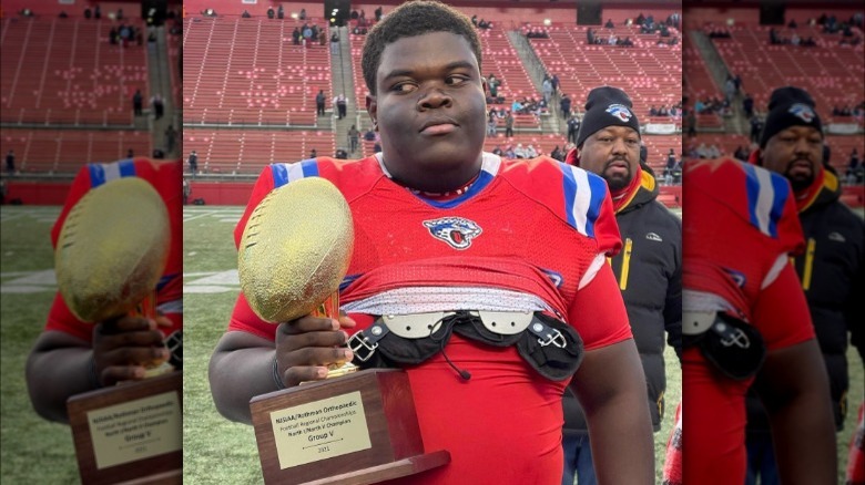 Dieunerst Collin holding football trophy