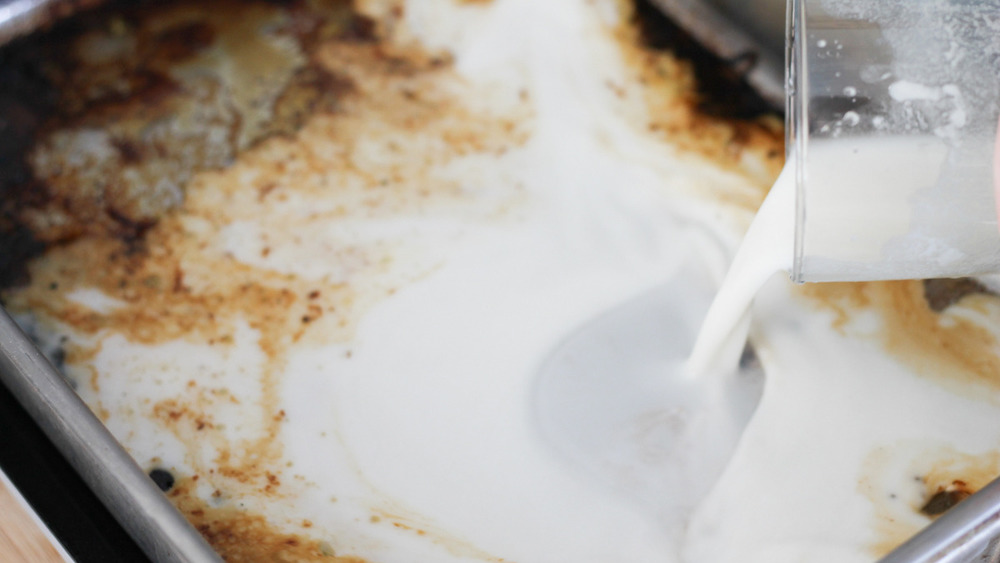 Pan of drippings from pork loin recipe