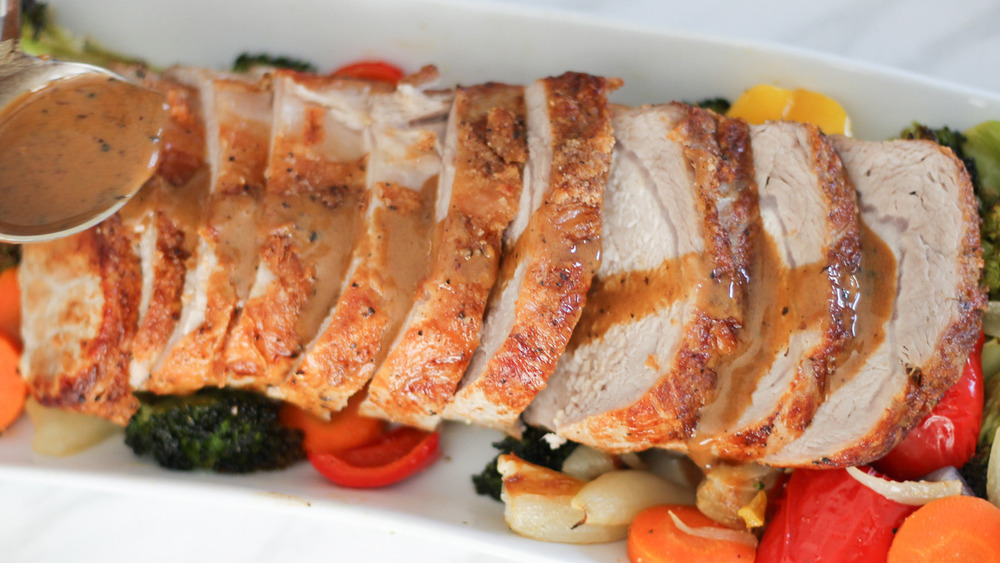 pork loin recipe and vegetables on a pan