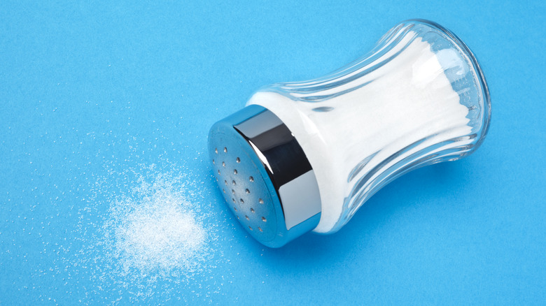 Salt Spilled on blue background