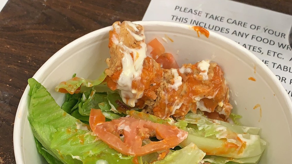 Messy Buffalo Wings salad in a bowl 