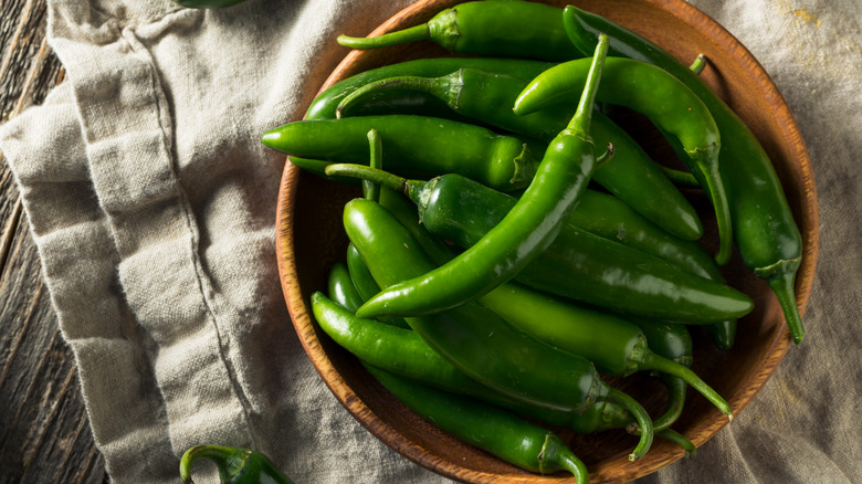 Serrano peppers in wooden bowl