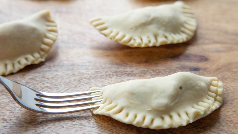 crimping exterior of empanada