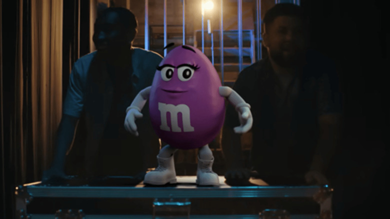 The Purple Mandm Is Already Getting Shipped With A Fast Food Mascot