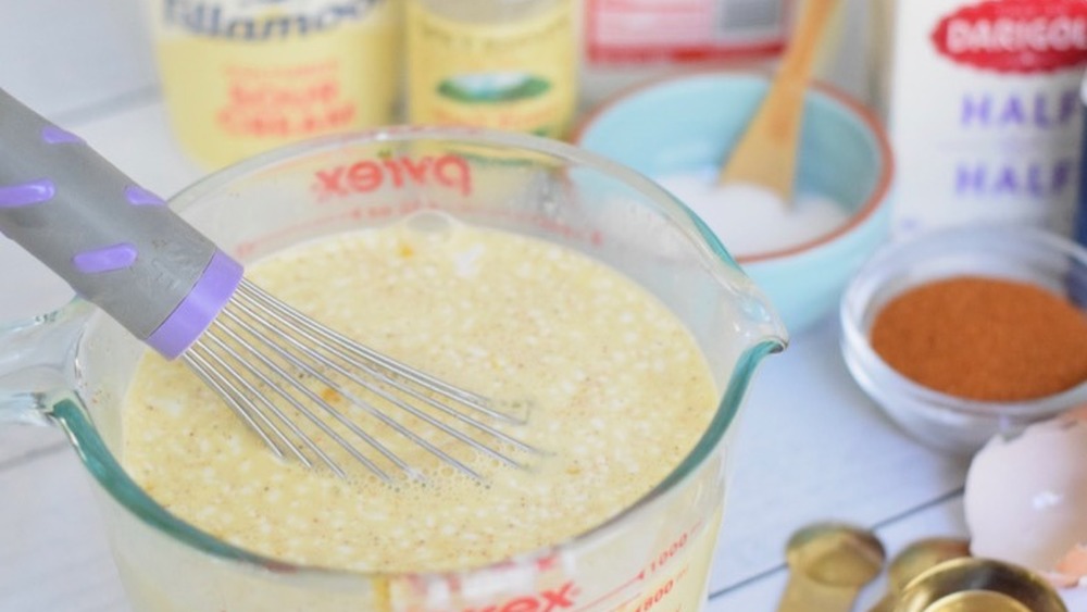 eggs whisked with milk, sour cream, and spices