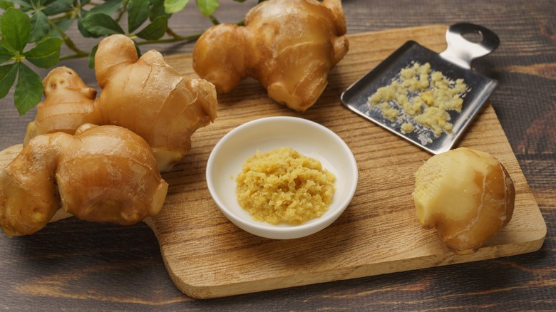 Grated ginger on cutting board