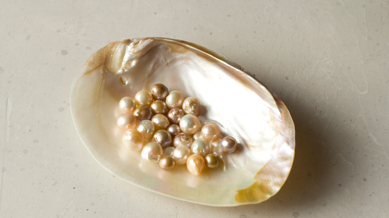 Sea shell full of pearls