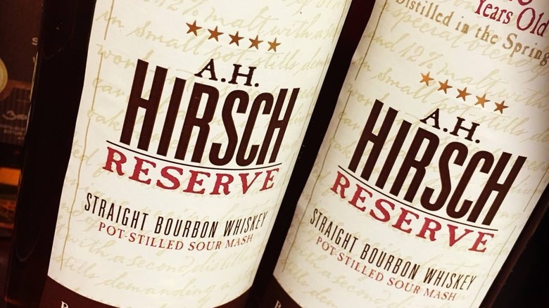 Two bottles of A.H. Hirsch reserve bourbon whiskey