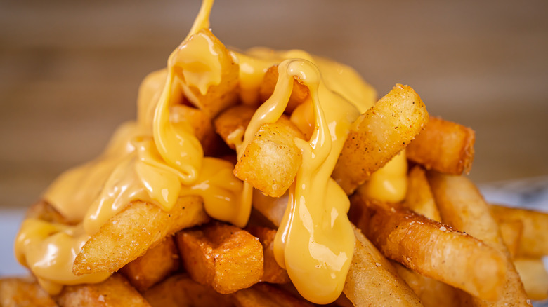 cheese sauce poured over fries