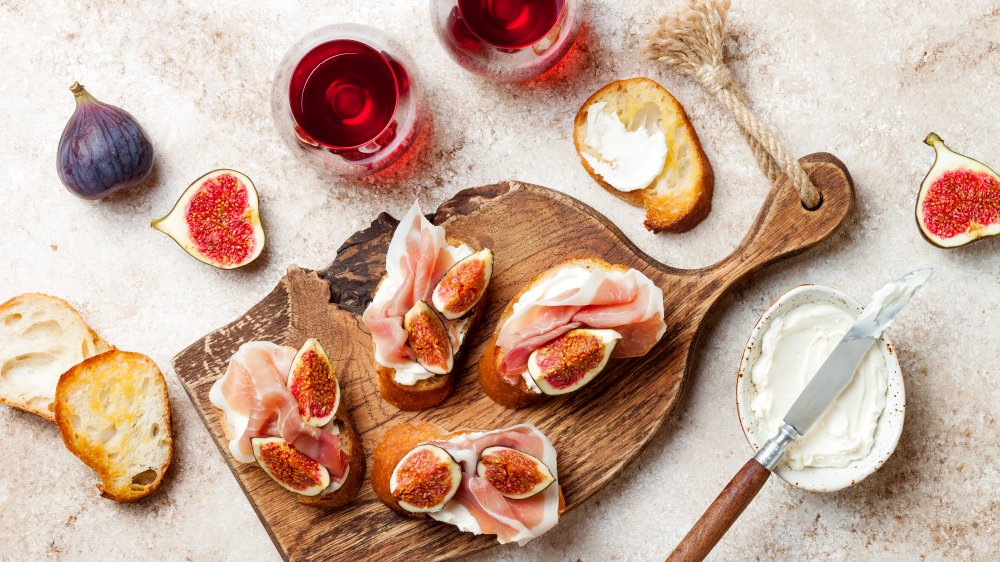 Bruschetta topped with prosciutto and fig