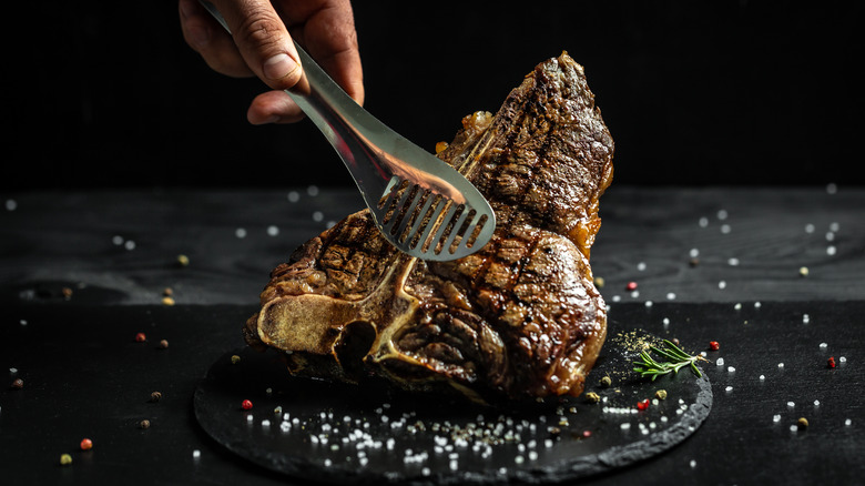 Chef cooking steak