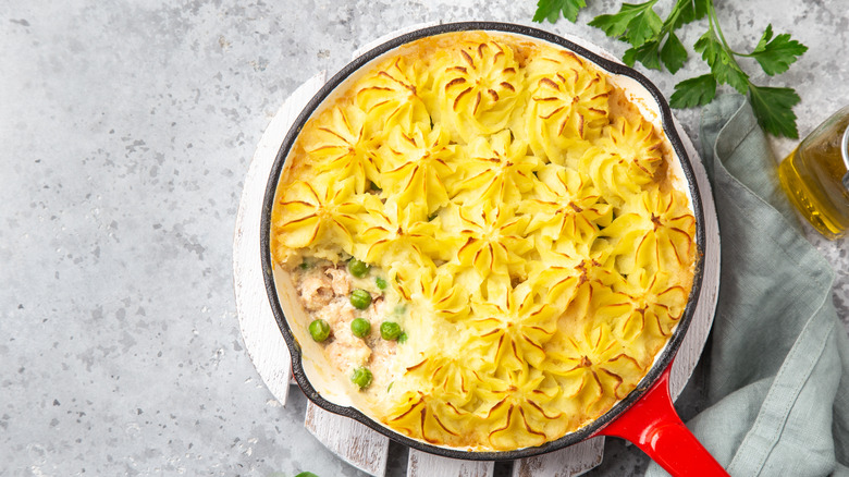 salmon shepherd's pie in enameled cast iron 