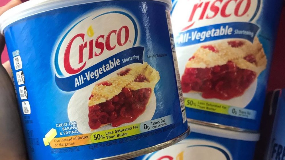 Blue containers of Crisco