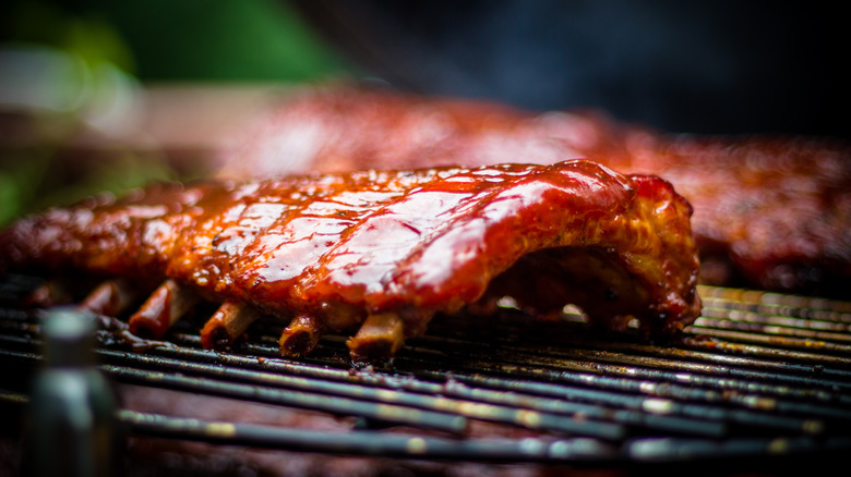 Slab of barbecue ribs on grill