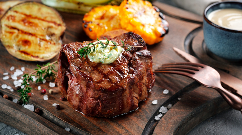 Steak on a wooden platter