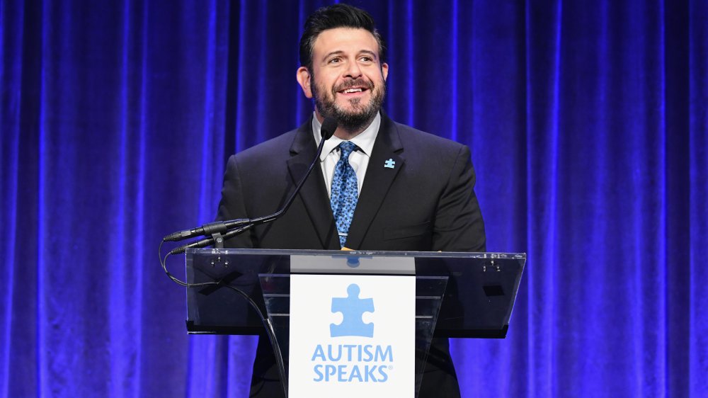 Adam Richman speaks at an event