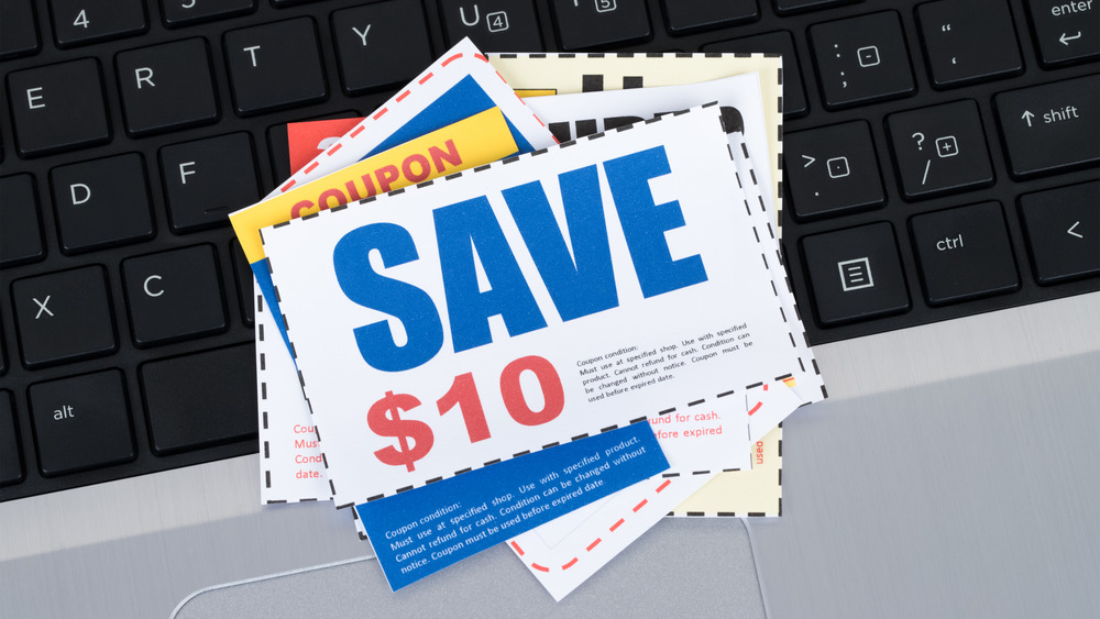 Coupons on laptop keyboard