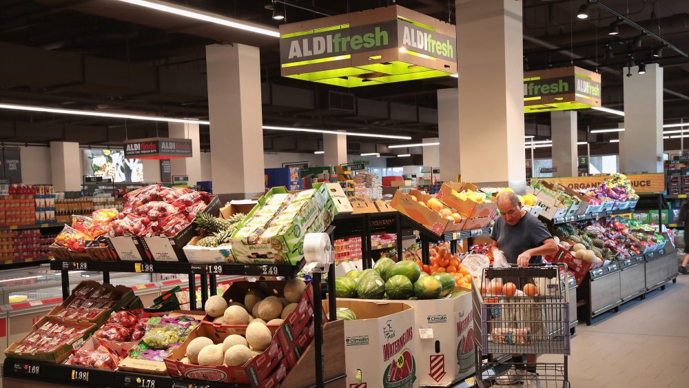 man shopping inside an Aldi