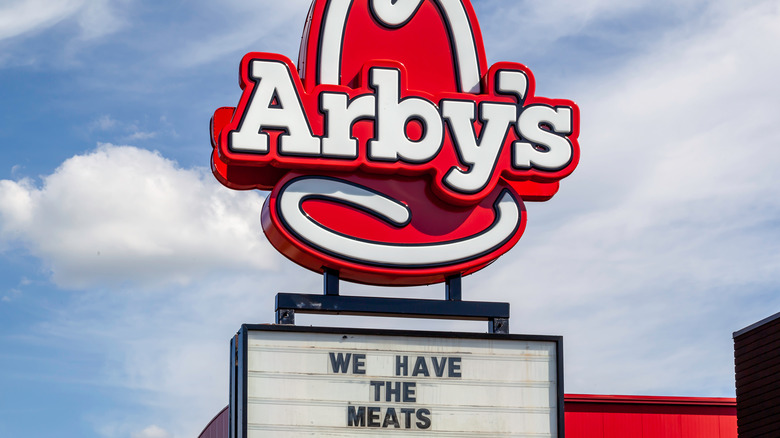 Arbys sign with slogan "We have the  meats"