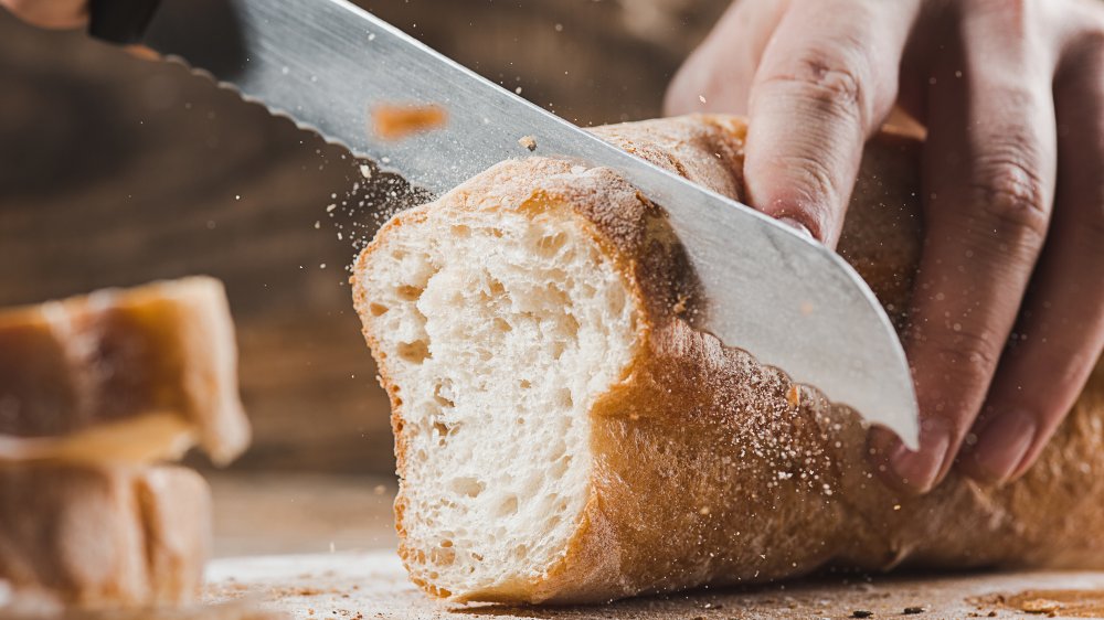 slicing fresh bread