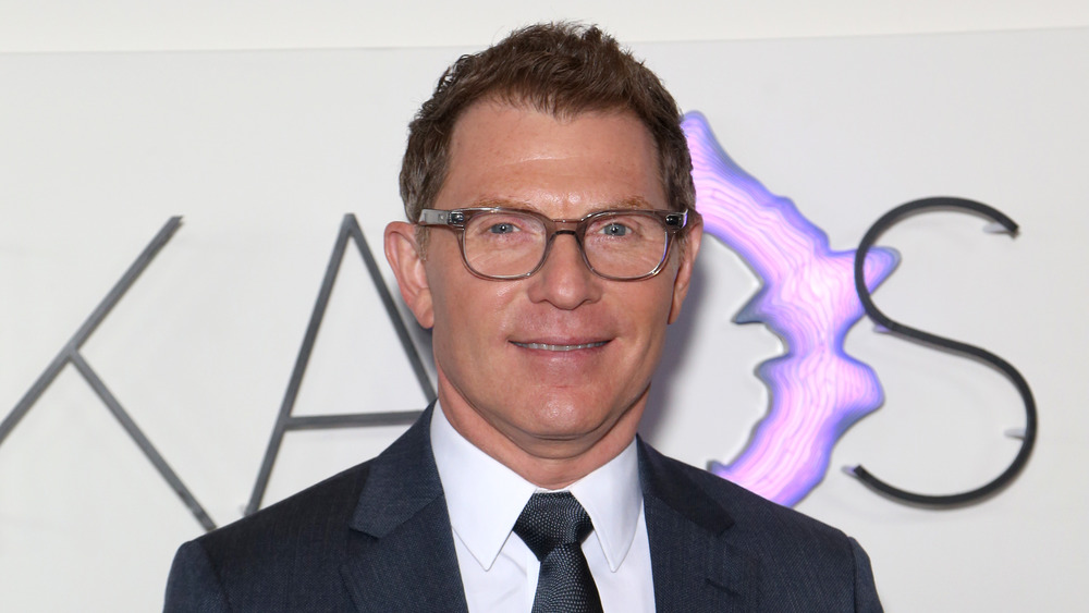 Bobby Flay smiling in glasses