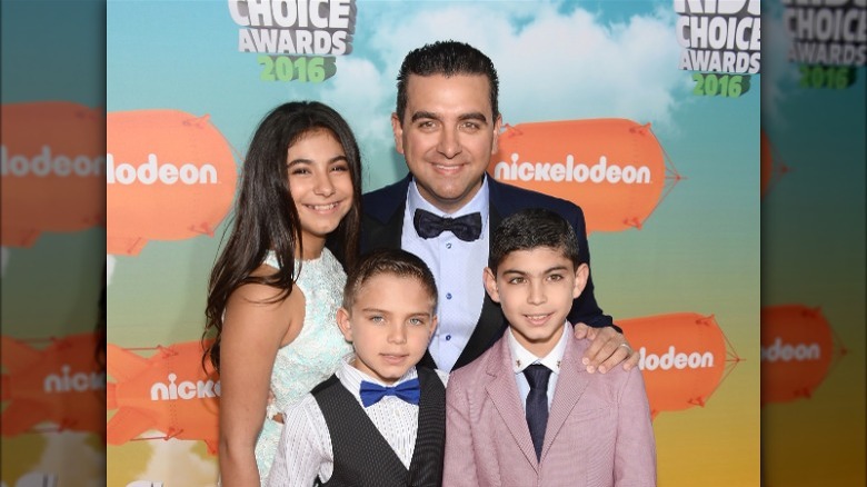 Buddy Valastro smiling with children