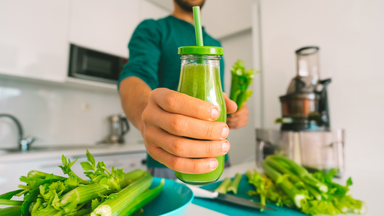 Man making celery juice