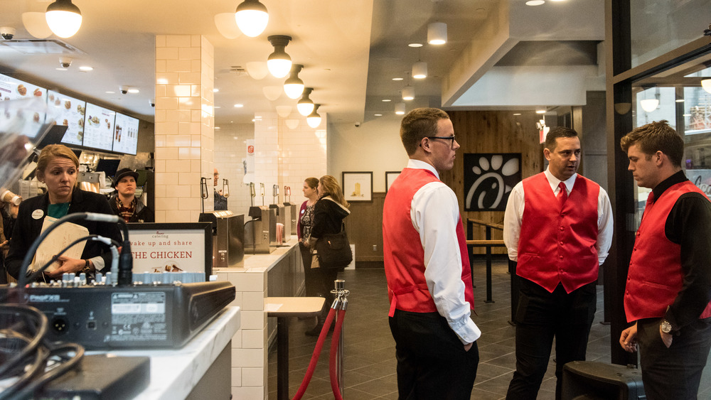 Employees inside a Chick-fil-A restaurant